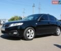 Чорний Кіа Маджентіс, об'ємом двигуна 2 л та пробігом 175 тис. км за 6500 $, фото 1 на Automoto.ua