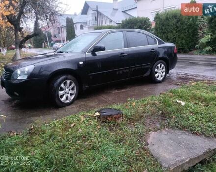 Чорний Кіа Маджентіс, об'ємом двигуна 2 л та пробігом 100 тис. км за 4800 $, фото 5 на Automoto.ua