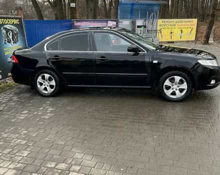 Черный Киа Маджентис, объемом двигателя 2 л и пробегом 216 тыс. км за 5250 $, фото 2 на Automoto.ua