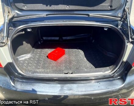 Черный Киа Маджентис, объемом двигателя 2 л и пробегом 260 тыс. км за 4999 $, фото 3 на Automoto.ua