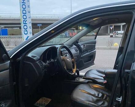 Черный Киа Маджентис, объемом двигателя 2 л и пробегом 208 тыс. км за 6400 $, фото 23 на Automoto.ua