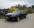 Черный Киа Маджентис, объемом двигателя 2 л и пробегом 218 тыс. км за 5487 $, фото 1 на Automoto.ua