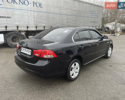 Чорний Кіа Маджентіс, об'ємом двигуна 2 л та пробігом 213 тис. км за 6700 $, фото 4 на Automoto.ua