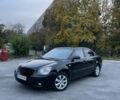 Черный Киа Маджентис, объемом двигателя 2 л и пробегом 244 тыс. км за 3851 $, фото 1 на Automoto.ua