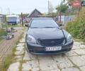Черный Киа Маджентис, объемом двигателя 2 л и пробегом 439 тыс. км за 5400 $, фото 1 на Automoto.ua