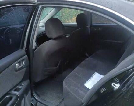 Чорний Кіа Маджентіс, об'ємом двигуна 2 л та пробігом 100 тис. км за 4800 $, фото 3 на Automoto.ua