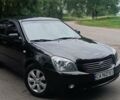 Чорний Кіа Маджентіс, об'ємом двигуна 2 л та пробігом 262 тис. км за 4499 $, фото 1 на Automoto.ua
