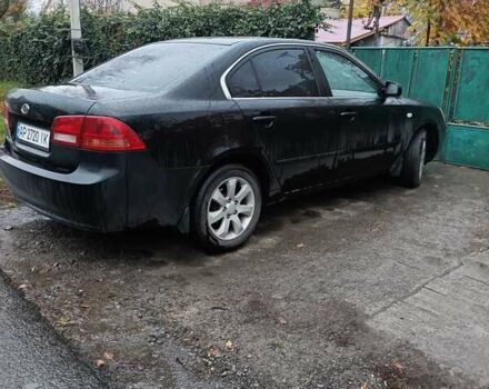 Чорний Кіа Маджентіс, об'ємом двигуна 2 л та пробігом 100 тис. км за 4800 $, фото 7 на Automoto.ua