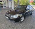 Черный Киа Маджентис, объемом двигателя 2 л и пробегом 190 тыс. км за 6600 $, фото 1 на Automoto.ua