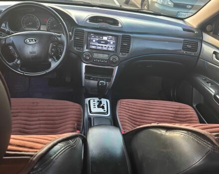 Черный Киа Маджентис, объемом двигателя 2 л и пробегом 317 тыс. км за 5200 $, фото 4 на Automoto.ua
