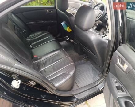 Чорний Кіа Маджентіс, об'ємом двигуна 2 л та пробігом 439 тис. км за 5400 $, фото 1 на Automoto.ua