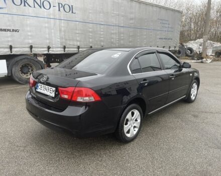 Чорний Кіа Маджентіс, об'ємом двигуна 2 л та пробігом 213 тис. км за 6700 $, фото 4 на Automoto.ua