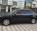 Чорний Кіа Маджентіс, об'ємом двигуна 2 л та пробігом 250 тис. км за 242000 $, фото 1 на Automoto.ua