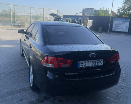 Чорний Кіа Маджентіс, об'ємом двигуна 2 л та пробігом 203 тис. км за 5700 $, фото 1 на Automoto.ua