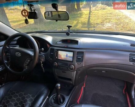 Чорний Кіа Маджентіс, об'ємом двигуна 2 л та пробігом 227 тис. км за 5650 $, фото 11 на Automoto.ua