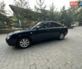 Черный Киа Маджентис, объемом двигателя 2 л и пробегом 362 тыс. км за 4300 $, фото 2 на Automoto.ua