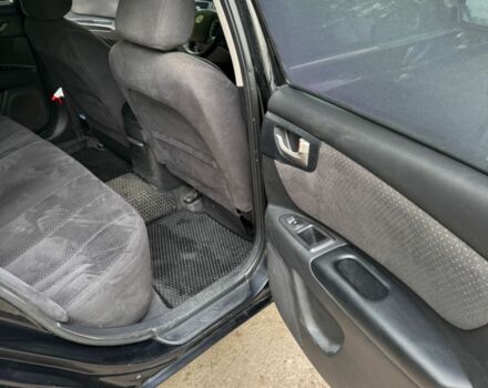 Черный Киа Маджентис, объемом двигателя 2 л и пробегом 300 тыс. км за 4501 $, фото 4 на Automoto.ua