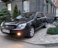 Чорний Кіа Маджентіс, об'ємом двигуна 2 л та пробігом 335 тис. км за 6500 $, фото 31 на Automoto.ua