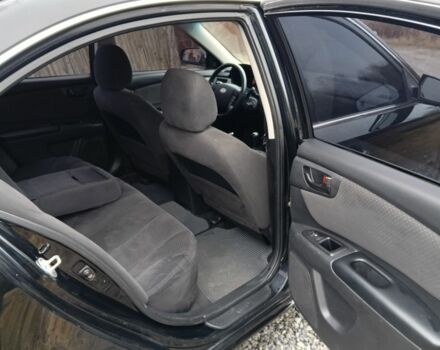 Чорний Кіа Маджентіс, об'ємом двигуна 2 л та пробігом 212 тис. км за 4950 $, фото 11 на Automoto.ua