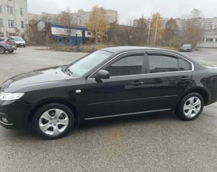 Чорний Кіа Маджентіс, об'ємом двигуна 2 л та пробігом 213 тис. км за 6700 $, фото 1 на Automoto.ua