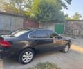 Черный Киа Маджентис, объемом двигателя 2 л и пробегом 265 тыс. км за 6800 $, фото 2 на Automoto.ua