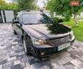 Чорний Кіа Маджентіс, об'ємом двигуна 2 л та пробігом 366 тис. км за 6500 $, фото 1 на Automoto.ua