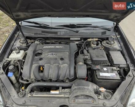 Черный Киа Маджентис, объемом двигателя 2 л и пробегом 236 тыс. км за 6000 $, фото 11 на Automoto.ua