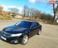 Черный Киа Маджентис, объемом двигателя 2 л и пробегом 196 тыс. км за 9300 $, фото 1 на Automoto.ua