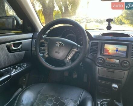 Чорний Кіа Маджентіс, об'ємом двигуна 2 л та пробігом 227 тис. км за 5650 $, фото 13 на Automoto.ua