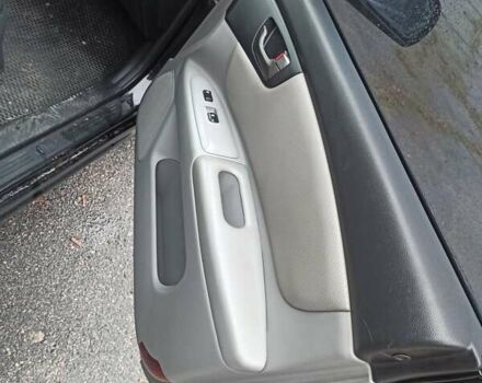 Черный Киа Маджентис, объемом двигателя 2 л и пробегом 226 тыс. км за 5500 $, фото 2 на Automoto.ua