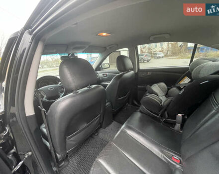 Чорний Кіа Маджентіс, об'ємом двигуна 2 л та пробігом 213 тис. км за 6700 $, фото 12 на Automoto.ua