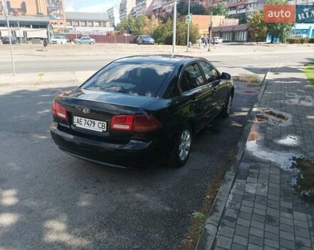 Черный Киа Маджентис, объемом двигателя 2 л и пробегом 367 тыс. км за 6000 $, фото 11 на Automoto.ua