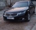 Черный Киа Маджентис, объемом двигателя 2 л и пробегом 255 тыс. км за 7000 $, фото 1 на Automoto.ua