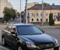 Черный Киа Маджентис, объемом двигателя 2 л и пробегом 260 тыс. км за 6000 $, фото 1 на Automoto.ua