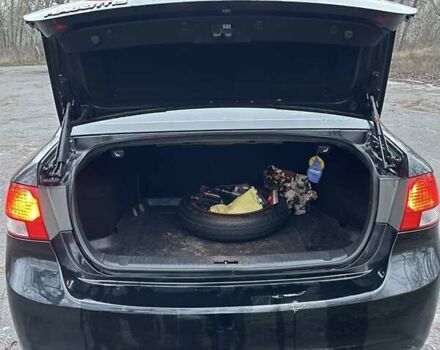 Черный Киа Маджентис, объемом двигателя 2 л и пробегом 222 тыс. км за 7200 $, фото 5 на Automoto.ua