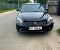 Черный Киа Маджентис, объемом двигателя 2 л и пробегом 197 тыс. км за 5800 $, фото 2 на Automoto.ua