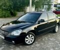 Чорний Кіа Маджентіс, об'ємом двигуна 2 л та пробігом 200 тис. км за 4350 $, фото 1 на Automoto.ua