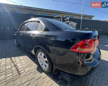 Чорний Кіа Маджентіс, об'ємом двигуна 2 л та пробігом 197 тис. км за 4700 $, фото 1 на Automoto.ua
