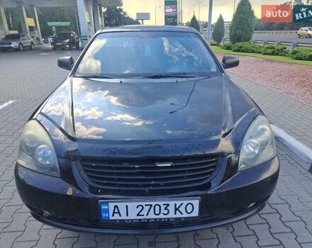 Черный Киа Маджентис, объемом двигателя 2 л и пробегом 237 тыс. км за 5400 $, фото 1 на Automoto.ua