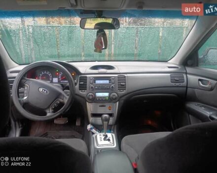 Чорний Кіа Маджентіс, об'ємом двигуна 2 л та пробігом 100 тис. км за 4800 $, фото 2 на Automoto.ua