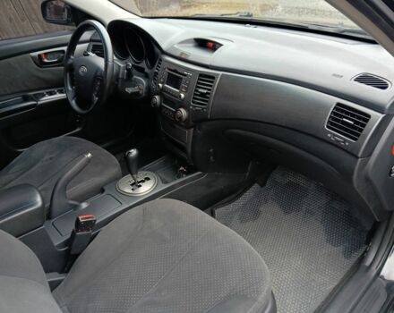 Чорний Кіа Маджентіс, об'ємом двигуна 2 л та пробігом 212 тис. км за 4950 $, фото 13 на Automoto.ua