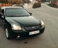 Черный Киа Маджентис, объемом двигателя 2 л и пробегом 219 тыс. км за 5500 $, фото 1 на Automoto.ua