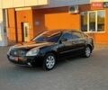 Черный Киа Маджентис, объемом двигателя 2 л и пробегом 262 тыс. км за 4290 $, фото 1 на Automoto.ua