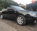 Черный Киа Маджентис, объемом двигателя 2 л и пробегом 228 тыс. км за 5500 $, фото 4 на Automoto.ua