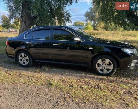 Чорний Кіа Маджентіс, об'ємом двигуна 2 л та пробігом 227 тис. км за 5650 $, фото 6 на Automoto.ua