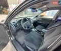 Черный Киа Маджентис, объемом двигателя 2 л и пробегом 330 тыс. км за 4999 $, фото 1 на Automoto.ua