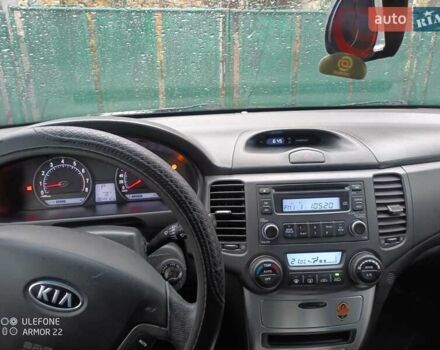 Чорний Кіа Маджентіс, об'ємом двигуна 2 л та пробігом 100 тис. км за 4800 $, фото 1 на Automoto.ua