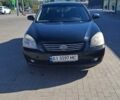 Чорний Кіа Маджентіс, об'ємом двигуна 2 л та пробігом 264 тис. км за 4500 $, фото 1 на Automoto.ua