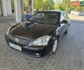 Черный Киа Маджентис, объемом двигателя 2 л и пробегом 192 тыс. км за 6600 $, фото 1 на Automoto.ua