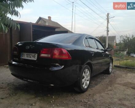 Черный Киа Маджентис, объемом двигателя 2 л и пробегом 228 тыс. км за 5500 $, фото 3 на Automoto.ua